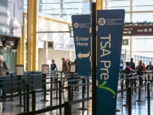 Traveler using TSA PreCheck and Global Entry to skip lines