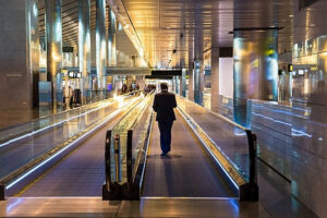 Traveler with suitcase symbolizing flexibility and readiness in GSA-certified corporate housing