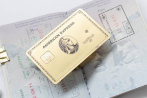 American Express Gold Card resting on a passport