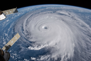 A tropical cyclone’s eye and spiral clouds photographed from space
