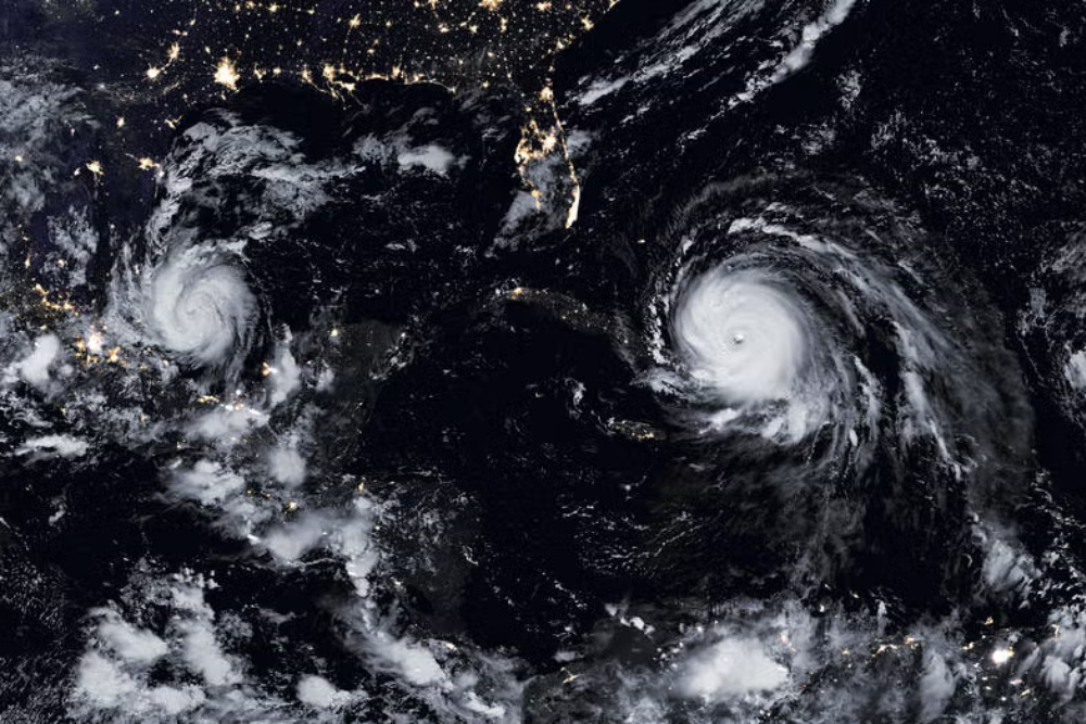 COVER Satellite view of two tropical cyclones near North America
